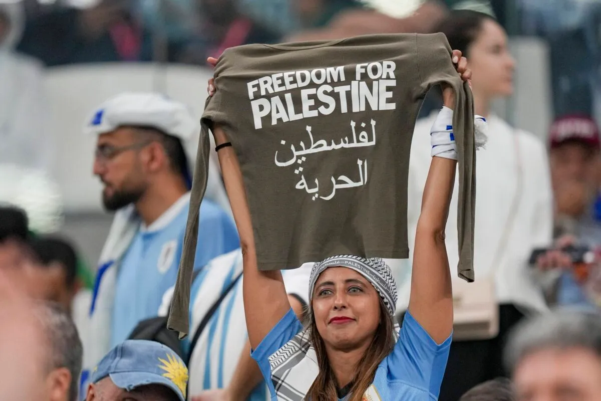 Supporter of Uruguay with Tshirt 'Freedom for Palestine' during the FIFA World Cup Qatar 2022 on November 28, 2022 in Lusail City, Qatar [Manuel Reino Berengui/DeFodi Images via Getty Images]