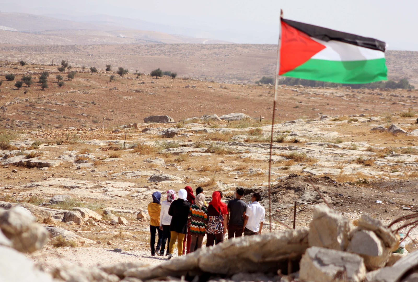 Dozens of Palestinians took part in an anti-settlement protest in al-Tuwana village and its neighboring villages in Masafer Yatta