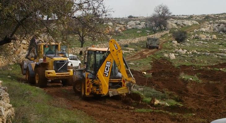 Israeli occupation bulldozers razed several dunums of Palestinian lands in the occupied West Bank city of Salfit.