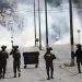 IOF Raid Town of Al-Ram, Attack Palestinian Citizens North Occupied Jerusalem