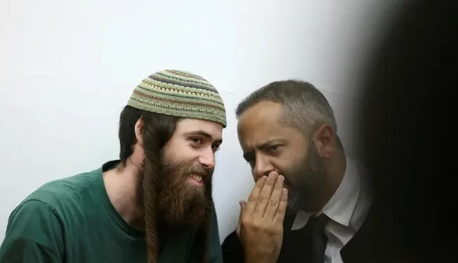 A Jerusalem court has decided to release one of the two main suspects in the murder of a 19-year-old Palestinian, Qosai Jammal Mi'tan, to home arrest on Tuesday. The suspect, Elisha Yered, is an Israeli settler who participated in the shooting of Mi'tan last Friday night near the West Bank village of Beitin.