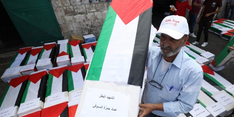 Palestinians Mark National Day to Retrieve Bodies of Victims Held by Israeli Occupation 