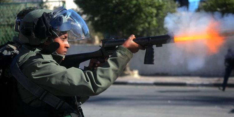 Israeli occupation forces shot and wounded a Palestinian youth with mental disabilities on Friday night during clashes that erupted in the West Bank city of Qalqilia, local sources reported.