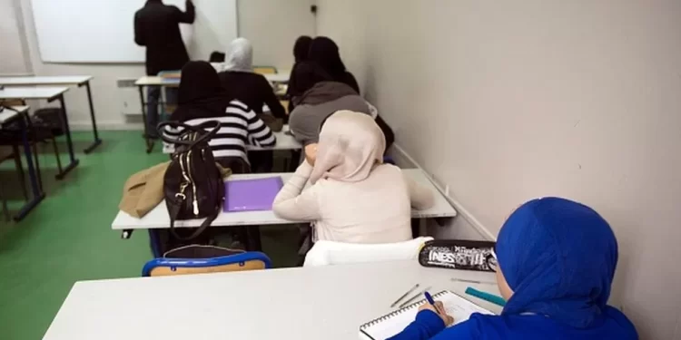 French Schools Enforce Abaya Ban, Leading to Student Protests