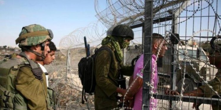 The Israeli occupation forces announced on Thursday the apprehension of two Palestinians who were allegedly attempting to cross the security fence from the northern Gaza Strip.
