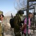 The Israeli occupation forces announced on Thursday the apprehension of two Palestinians who were allegedly attempting to cross the security fence from the northern Gaza Strip.