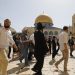 Israeli settlers, under Israeli police protection, are seen as they raid Al-Aqsa Mosque Compound in Jerusalem on 2 June 2019 (Photo credit: Ahmad Gharabli/AFP/Getty Images)