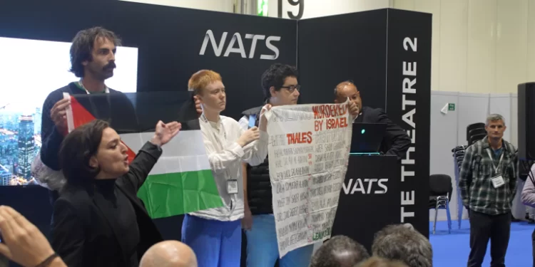 Activists from the Stop the War Coalition and Drone Wars UK staged a dramatic protest outside the Defense and Security Equipment International (DSEI) conference in London.