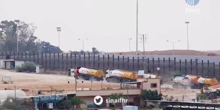 Egyptian Aid Trucks Depart Rafah Amid Israeli Warning