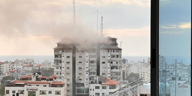 Israeli occupation warplanes targeted a 14-storey residential tower in Gaza City on Saturday, sending shockwaves through the already volatile region
