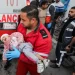 Israeli attacks on Gaza shelters kill 20 people