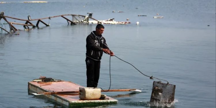 Gazan Fisherman Innovates Raft from Fridge Doors Amid Destruction of Gaza’s Fishing Sector