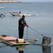 Gazan Fisherman Innovates Raft from Fridge Doors Amid Destruction of Gaza’s Fishing Sector