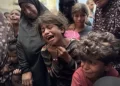 Israeli Attacks Target Civilian Areas in Gaza, Killing 12
